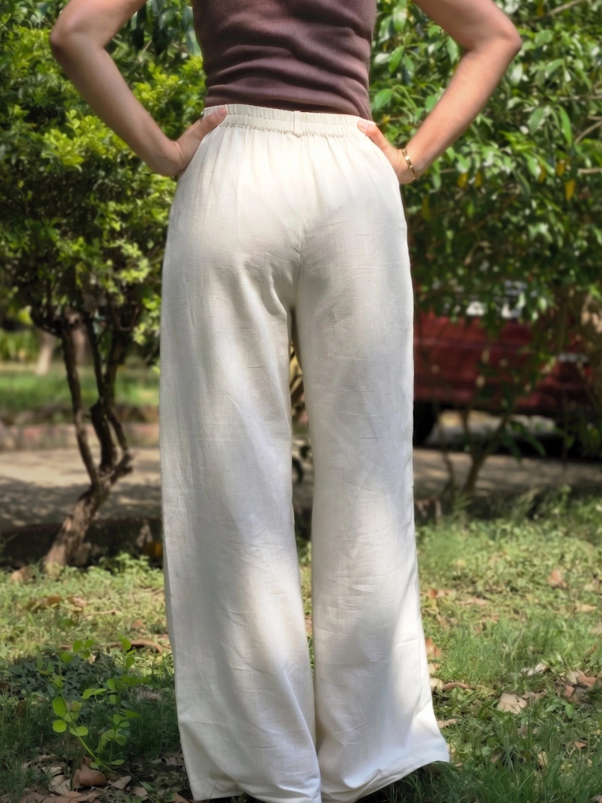 Close-up texture of breathable beige solid cotton linen flax fabric.