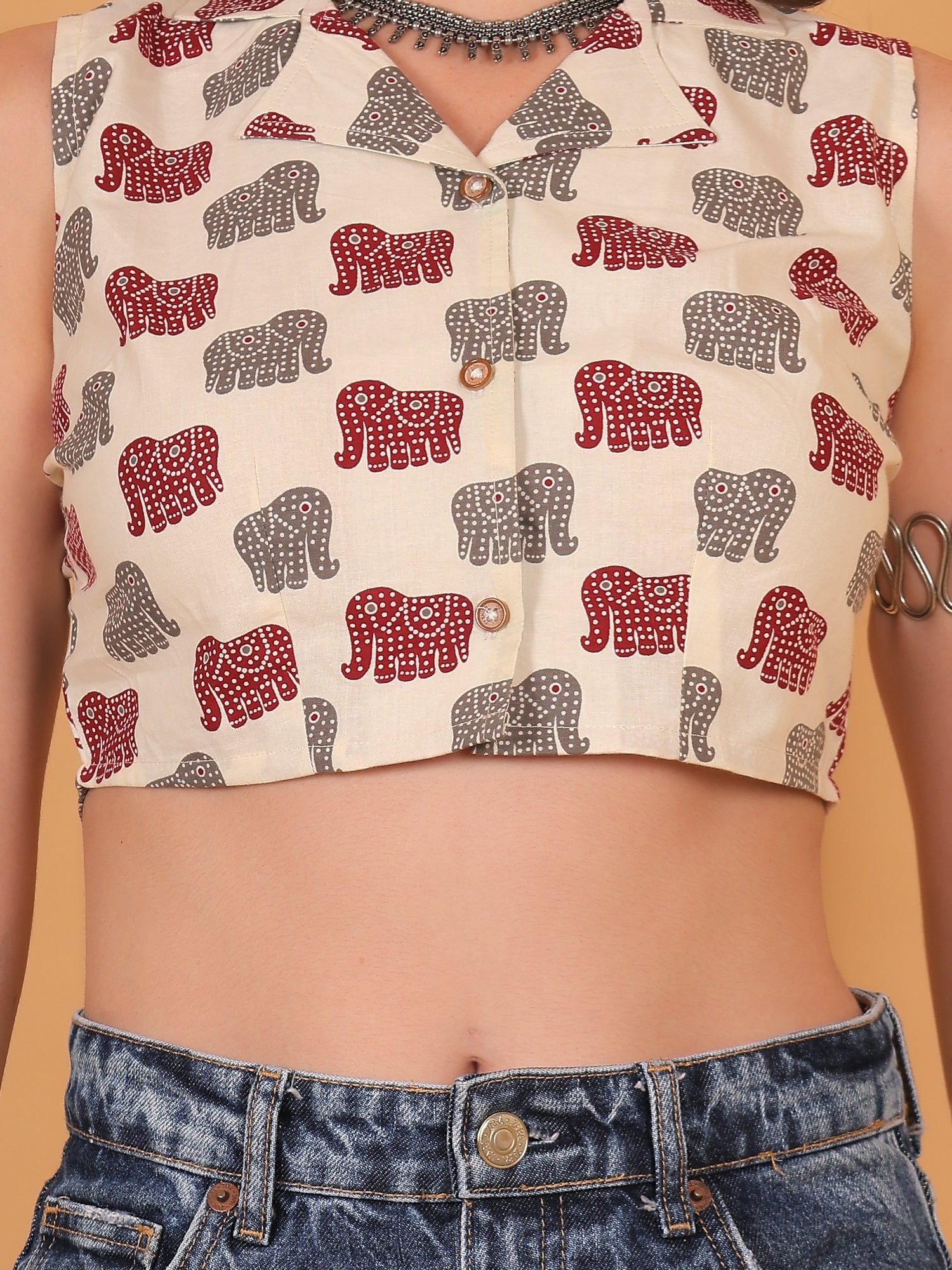 Breathable off-white cotton fabric with traditional block style animal print