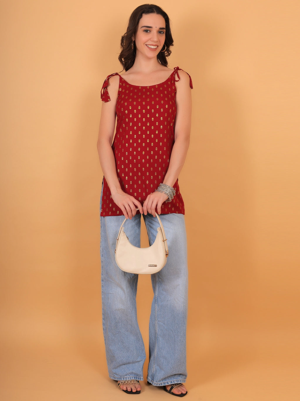 Regular fit opaque 100% rayon casual red kurti featuring a comfortable pull-on closure.