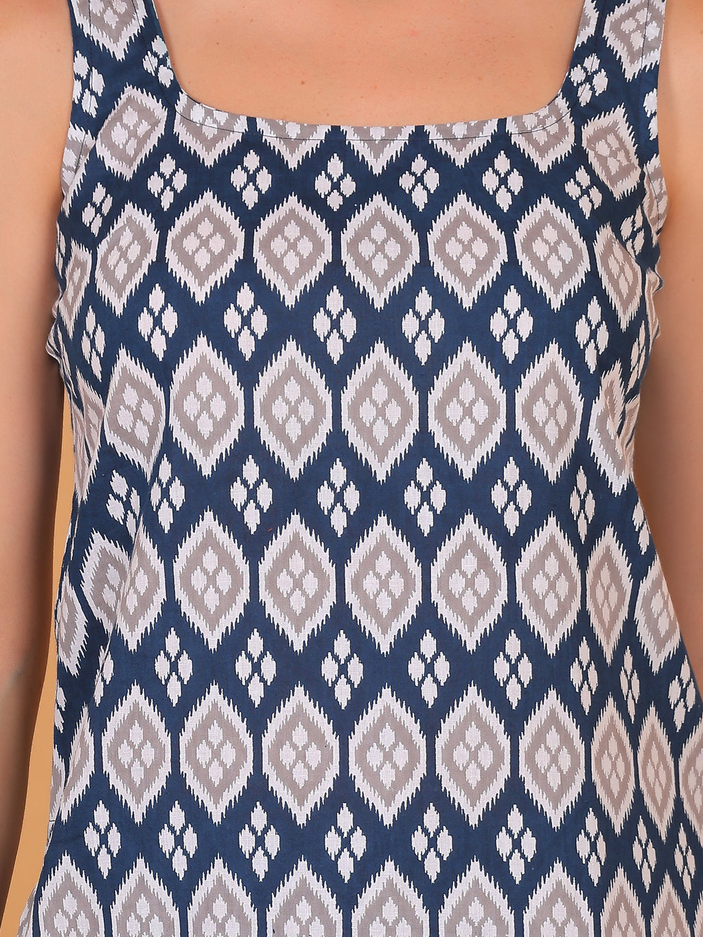 Close up of diamond geometric Ikat pattern on indigo blue fabric