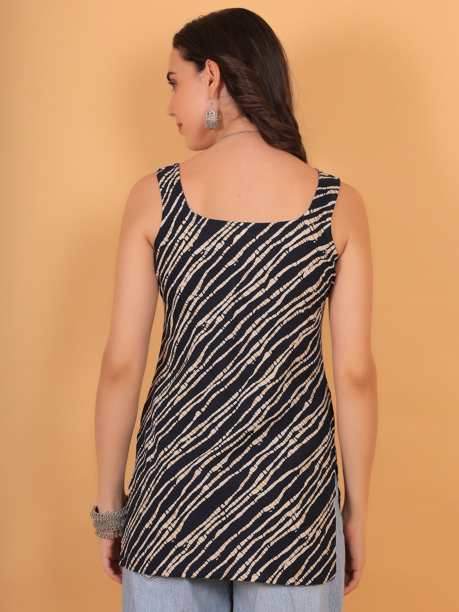 Back view of women's printed sleeveless cotton top with square neck and comfortable straight fit