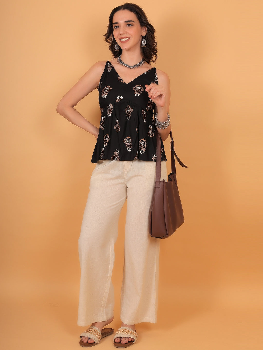 Opaque 100% rayon everyday wear casual kurti top with a comfortable pull-on closure.