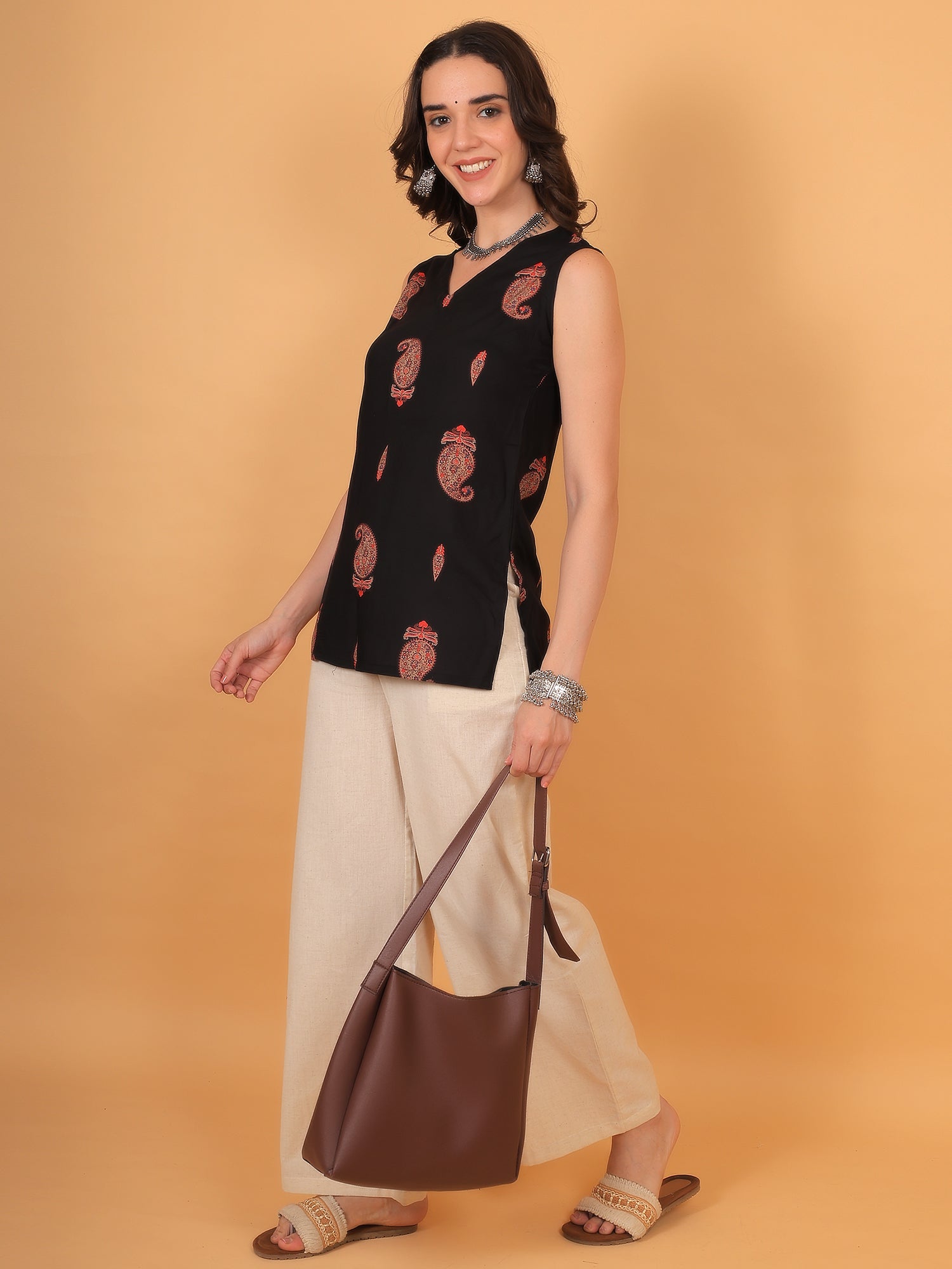Black sleeveless kurti for professional look
