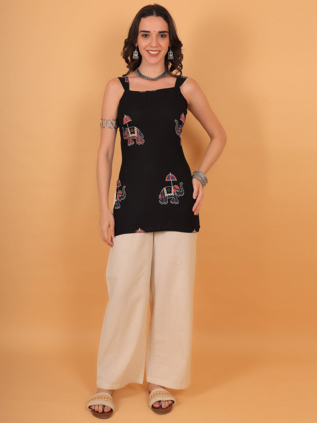 Regular fit opaque 100% rayon casual black kurti featuring a comfortable pull-on closure.