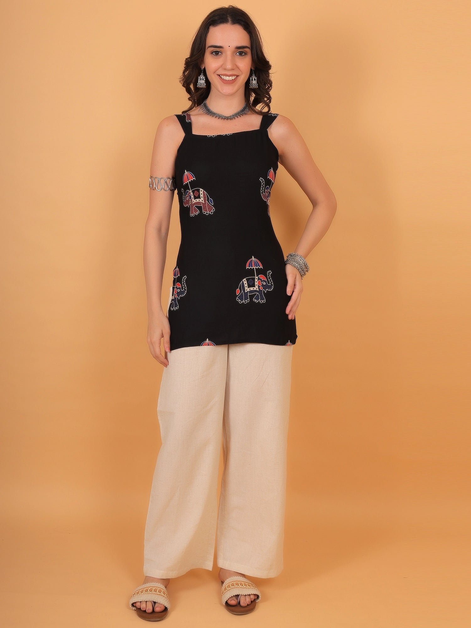 Regular fit opaque 100% rayon casual black kurti featuring a comfortable pull-on closure.