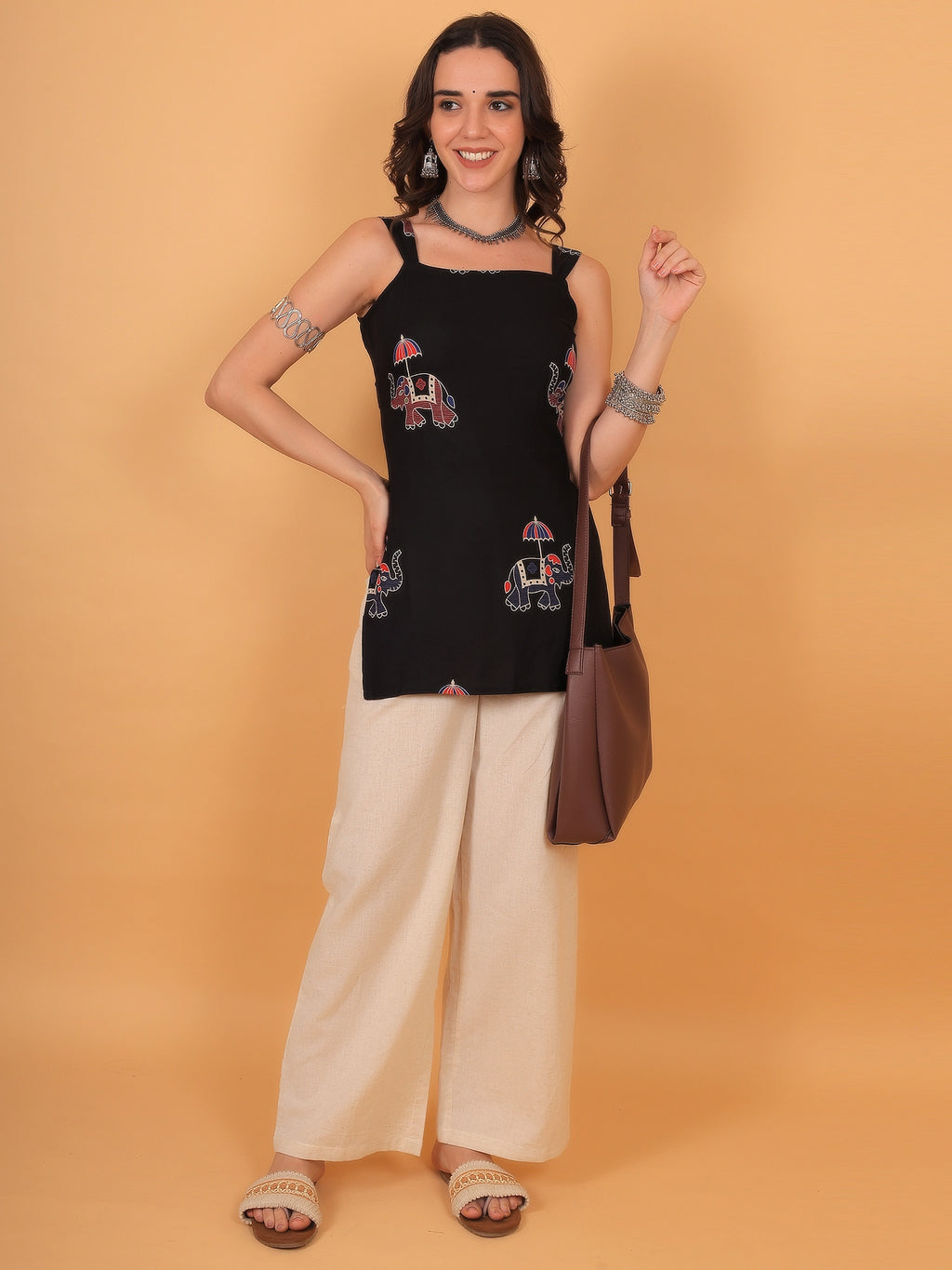 Regular fit opaque 100% rayon casual black kurti featuring a comfortable pull-on closure.
