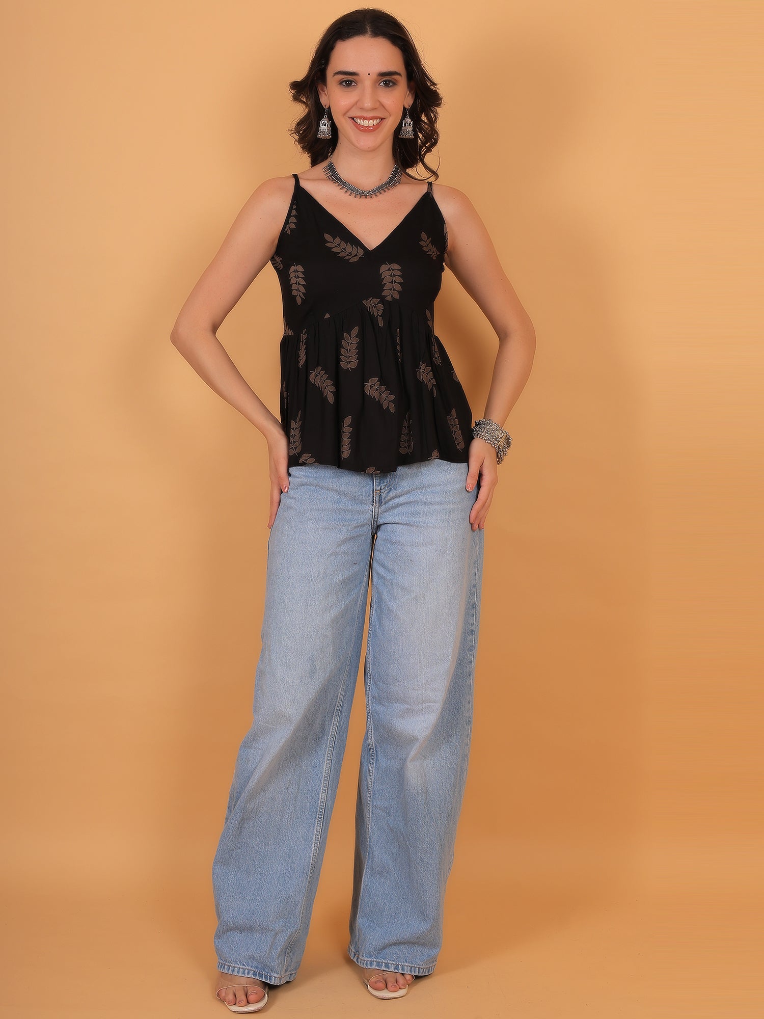 Black fit and flare top with wide leg denim