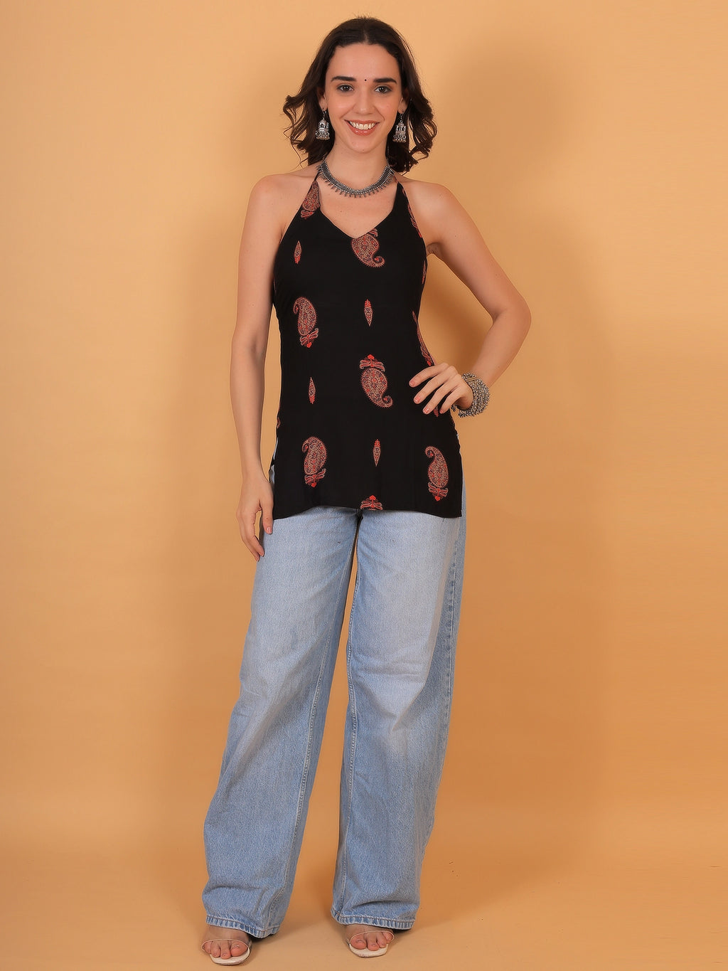 A stylish black and red paisley print rayon kurti for women, ideal for festival outfits, everyday wear, or ethnic parties.