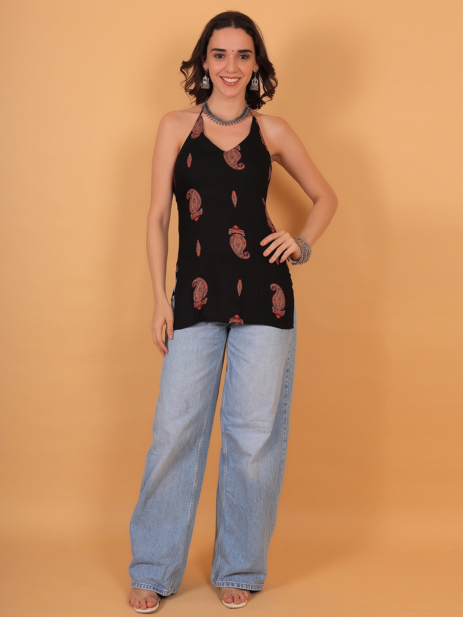 A stylish black and red paisley print rayon kurti for women, ideal for festival outfits, everyday wear, or ethnic parties.