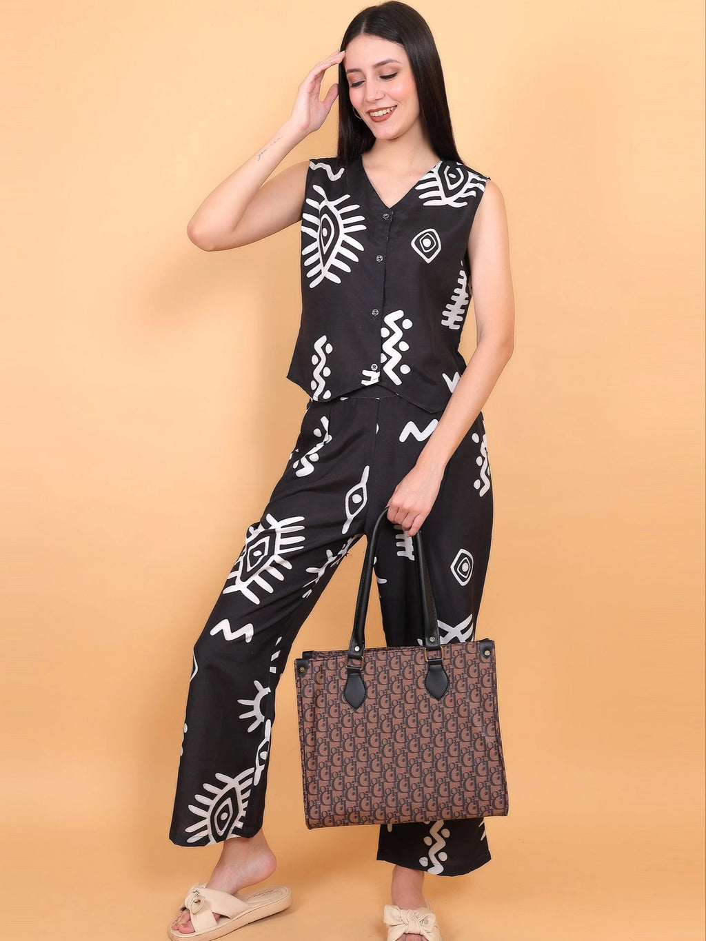 Zuacc black vest and pant matching set for women featuring an opaque polyrayon tribal print design.