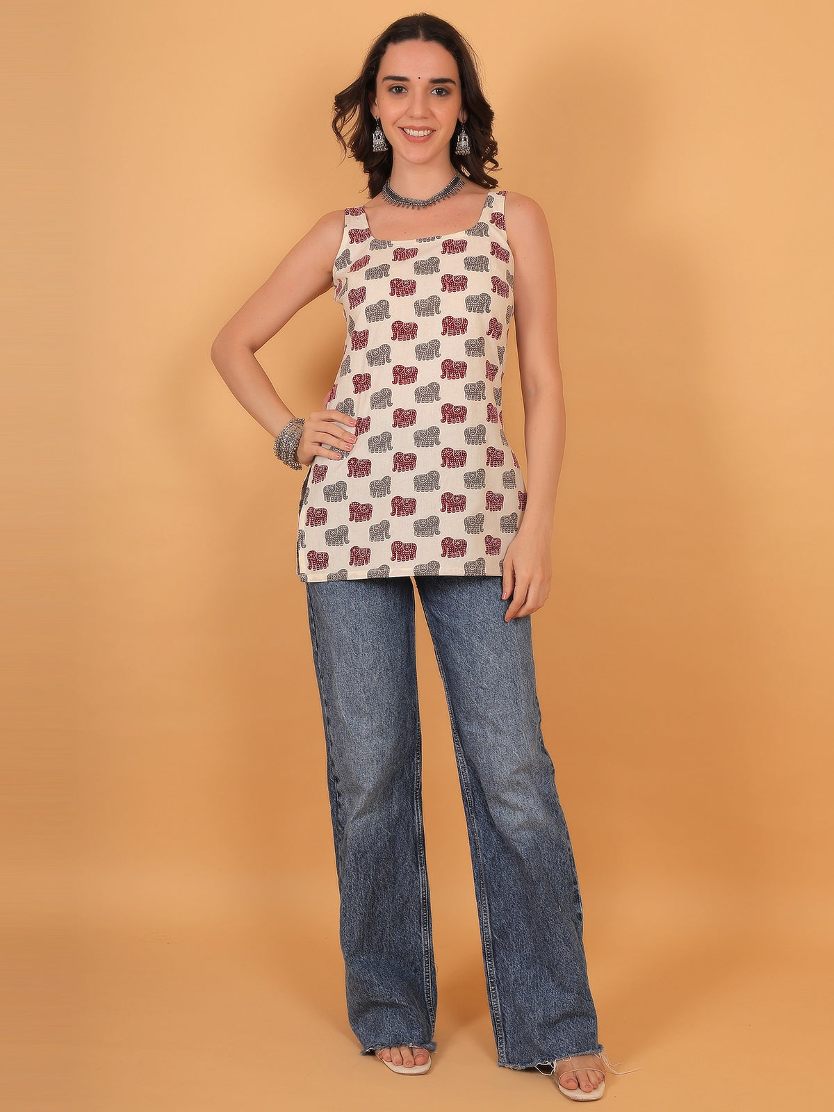 Sophisticated styling of the airavat short kurti with silver oxidized jewelry, making it a perfect outfit choice for an elegant festive wear look.