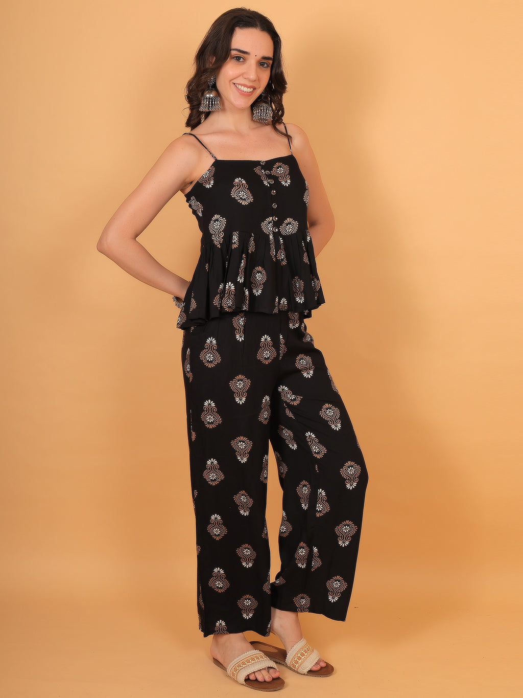 Soft black fabric with traditional beige paisley block print design.