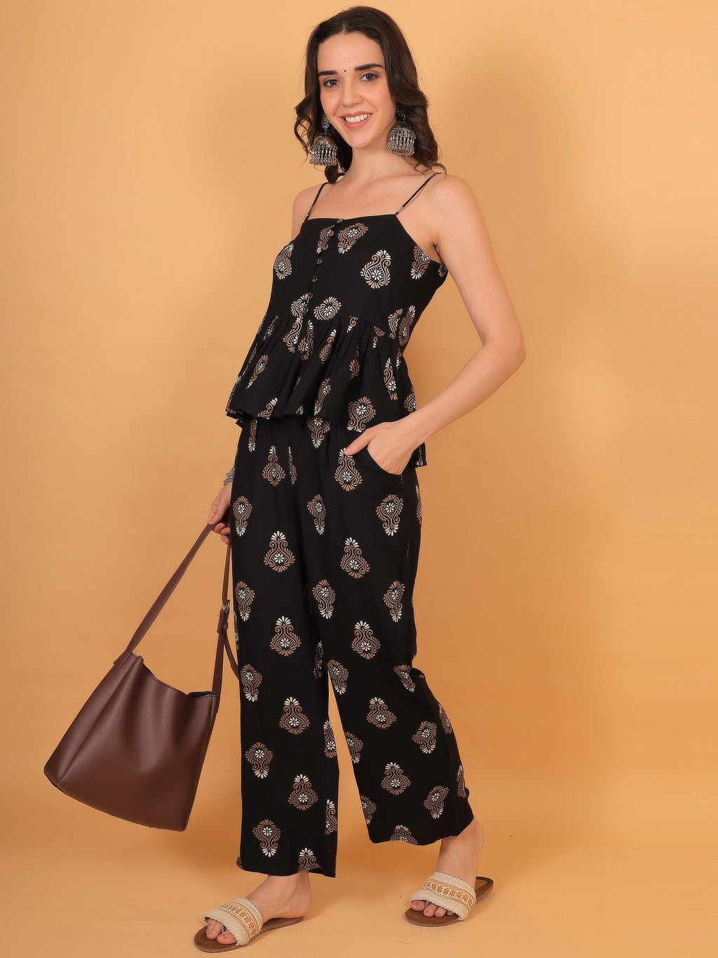 Party wear outfit idea: Black printed co-ord set styled with silver oxidized jewelry