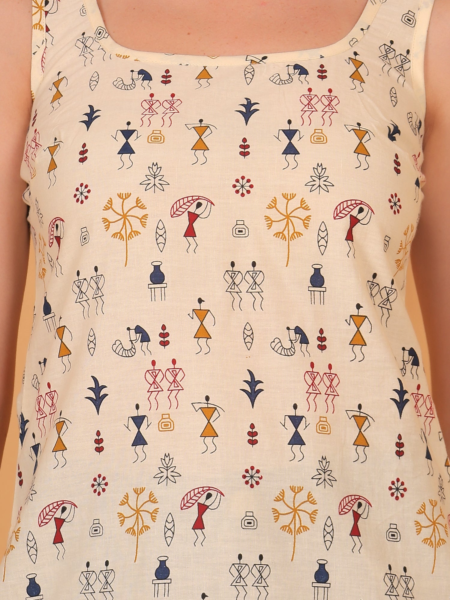 Breathable beige cotton kurti with artistic Indian folk print.