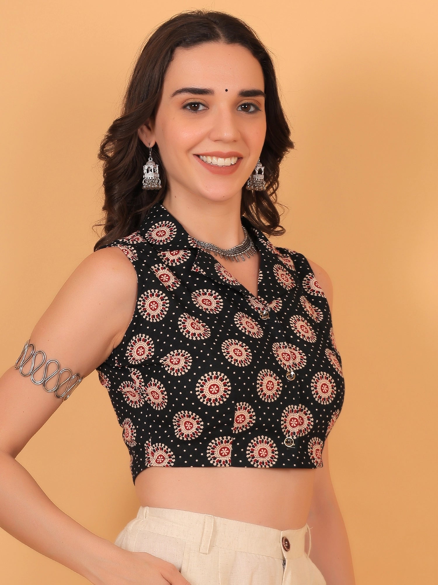 Side profile of the sleeveless chakra print shirt crop top, offering bohemian fusion wear fit inspo for women.