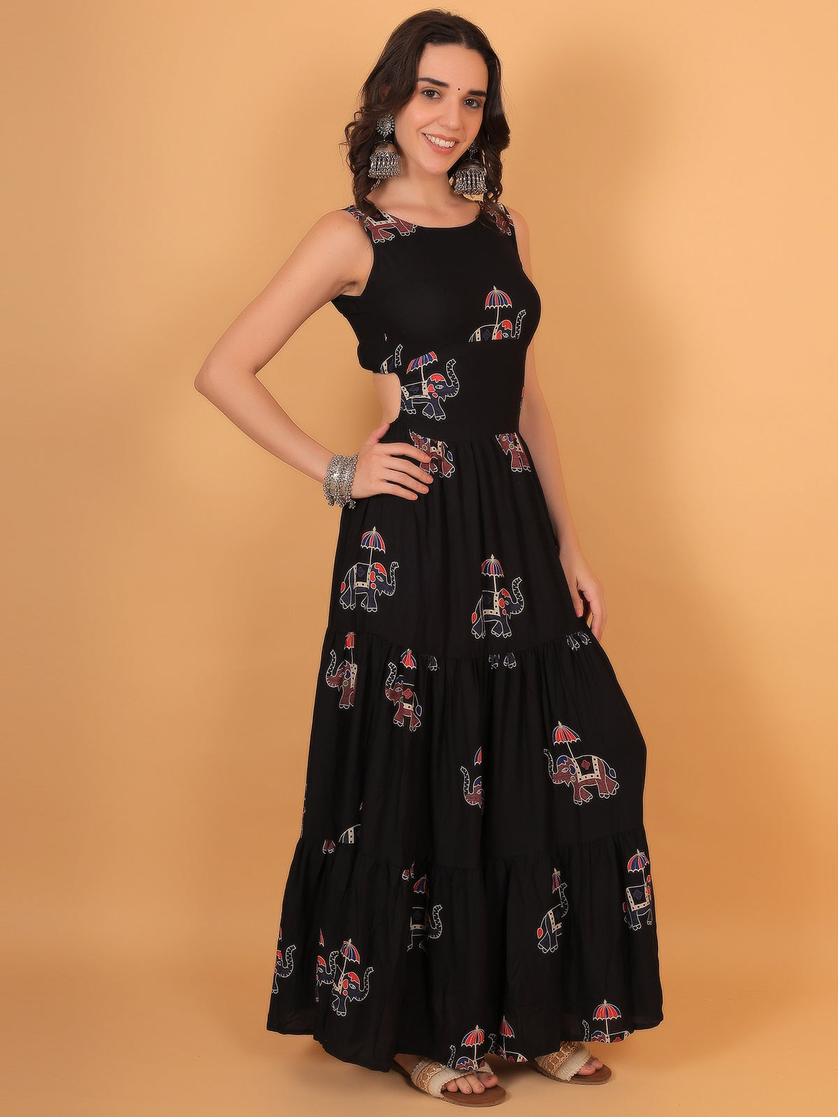 Beautiful movement of a women black Indo Western gown, making it a stellar outfit choice for festive occasions like Navratri, Diwali, or Rakshabandhan.