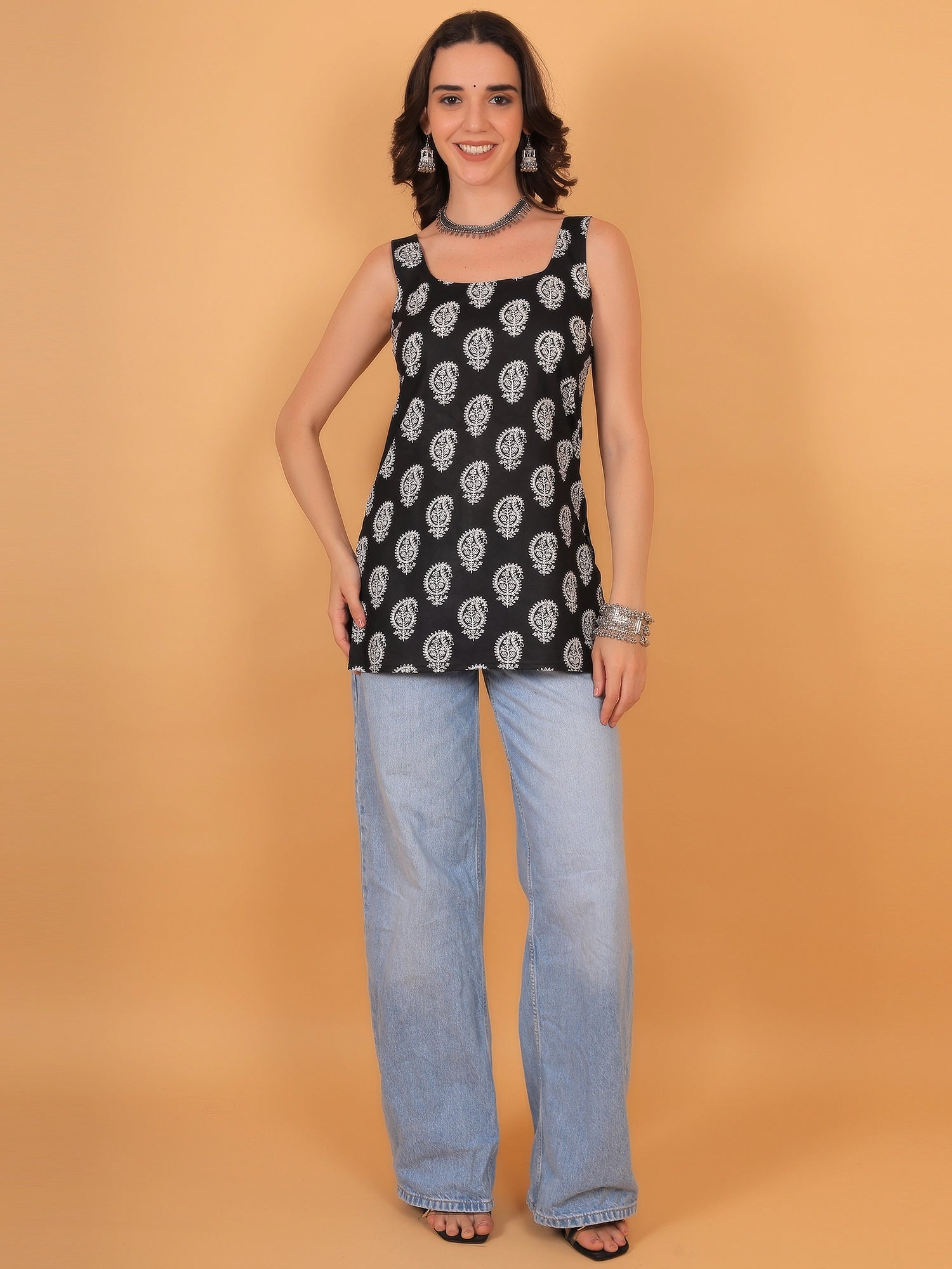 Full front view of black sleeveless Kaashni print cotton kurti for women's casual ethnic wear